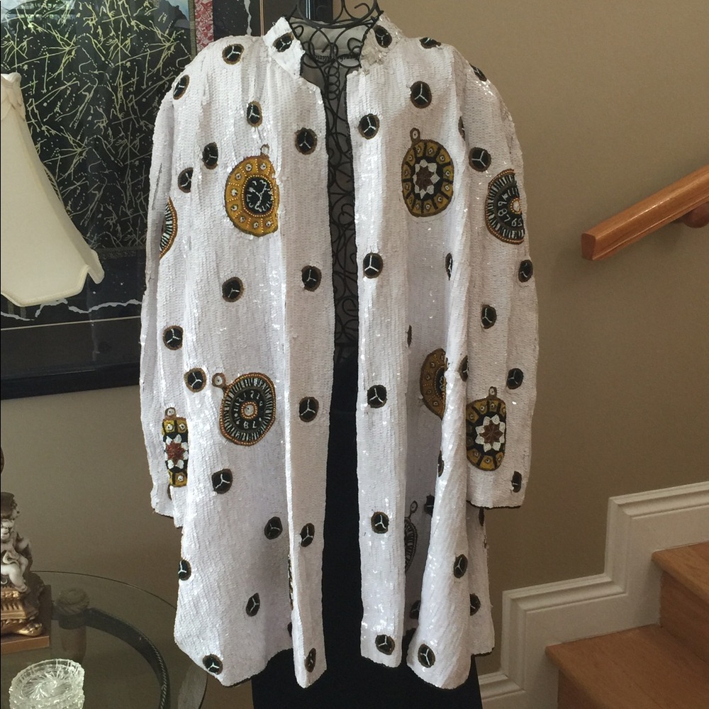 White sequin trapeze coat.